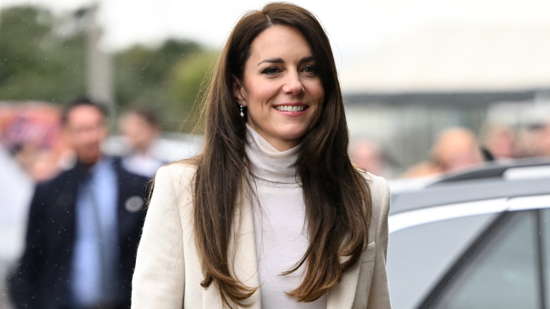 Princess Catherine walking and smiling