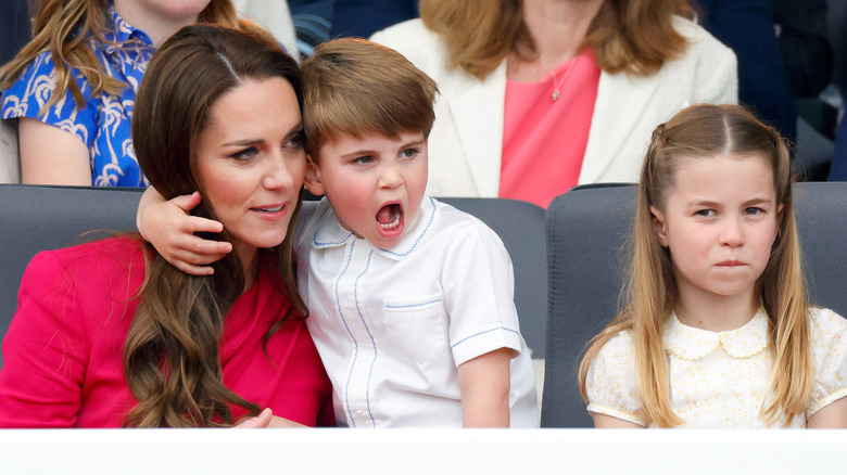 Prince Louis hugging Princess Catherine