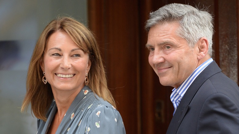 Carole and Michael Middleton smiling at each other