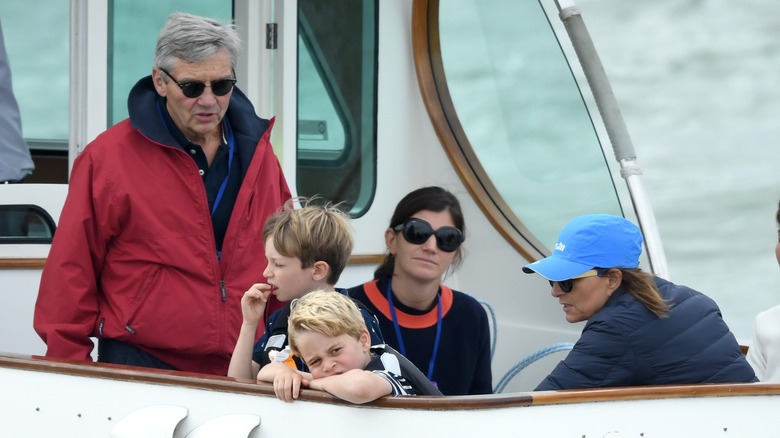 Michael and Carole Middleton on a boat with Prince George