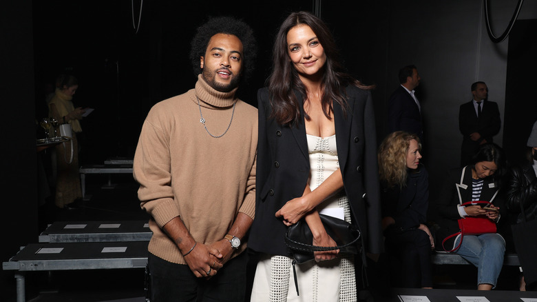 Bobby Wooten III, Katie Holmes posing together