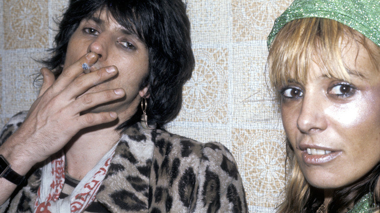 Keith Richards smoking Anita Pallenberg