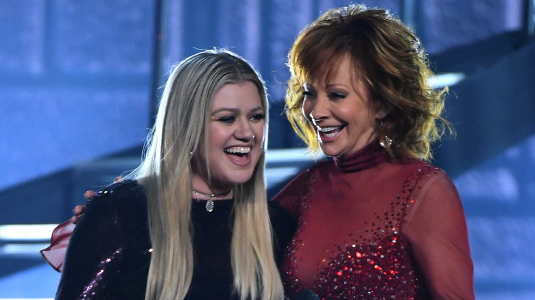 Kelly Clarkson and Reba McEntire red dress