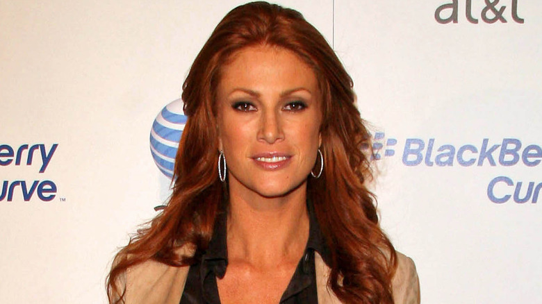 Angie Everhart smiling 