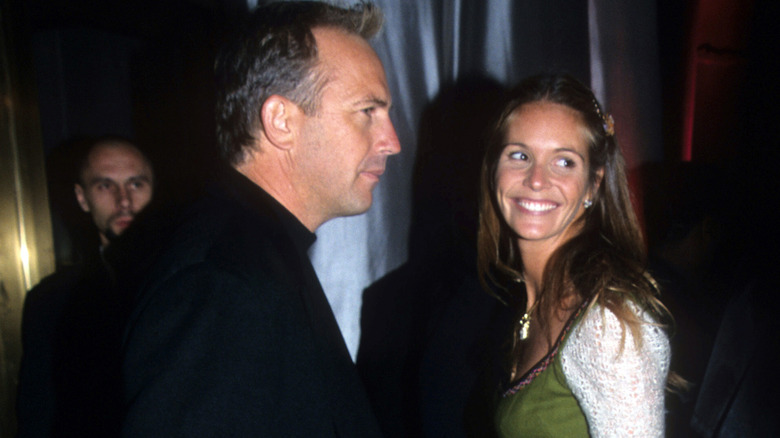 Kevin Costner and Elle MacPherson smiling 