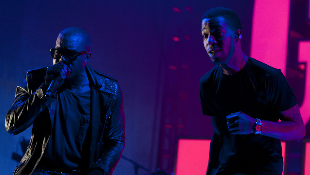 Kid Cudi and Kanye West perform onstage together