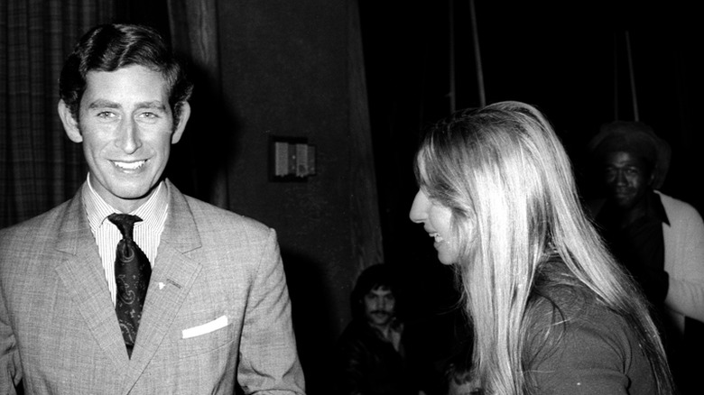 Prince Charles and Barbra Streisand smiling