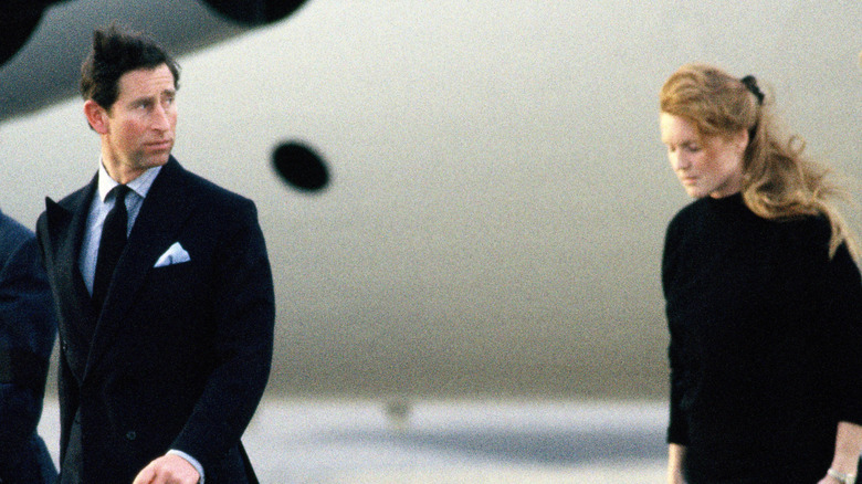 Older photo of King Charles and Sarah Ferguson walking