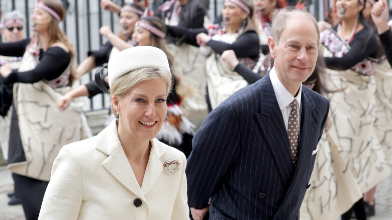 Prince Edward and Sophie smiling in crowd