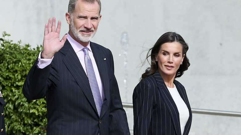 King Felipe and Queen Letizia in pinstripe suits