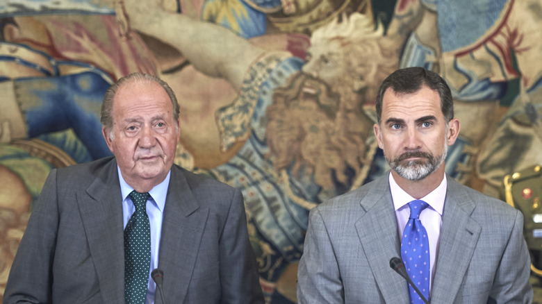 Former king Juan Carlos I and King Felipe in 2015 