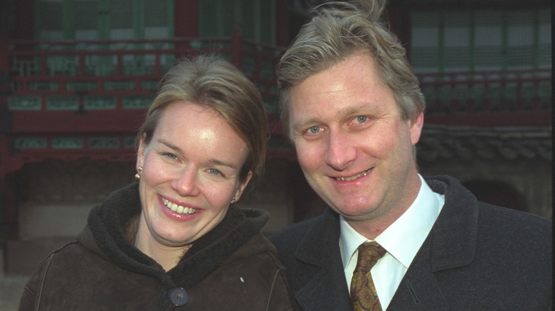 Queen Mathilde and King Philippe smiling