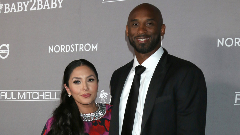 Kobe and Vanessa Bryant looking at the camera