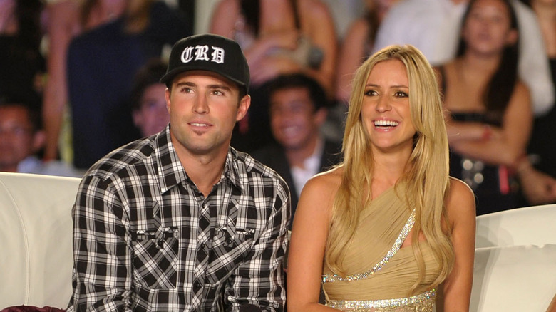 Kristin Cavallari, Brody Jenner siting on a sofa