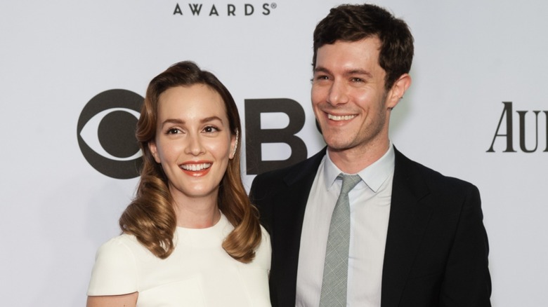 Leighton Meester and Adam Brody smiling
