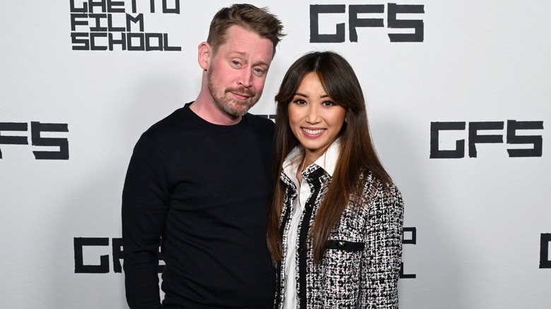 Macaulay Culkin and Brenda Song smiling