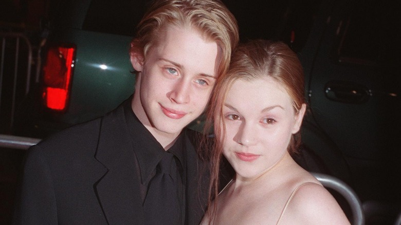 Macaulay Culkin and Rachel Miner posing