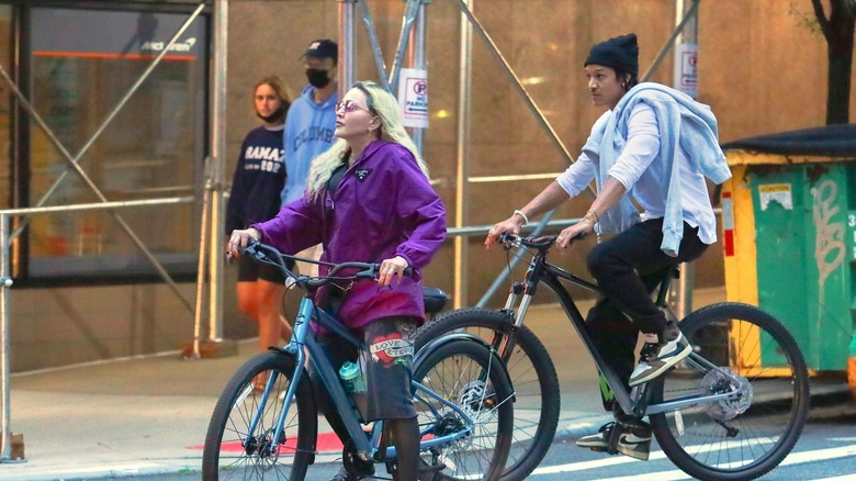 Madonna and Ahlamalik riding bicycles