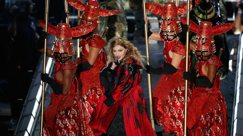 Madonna performing on tour