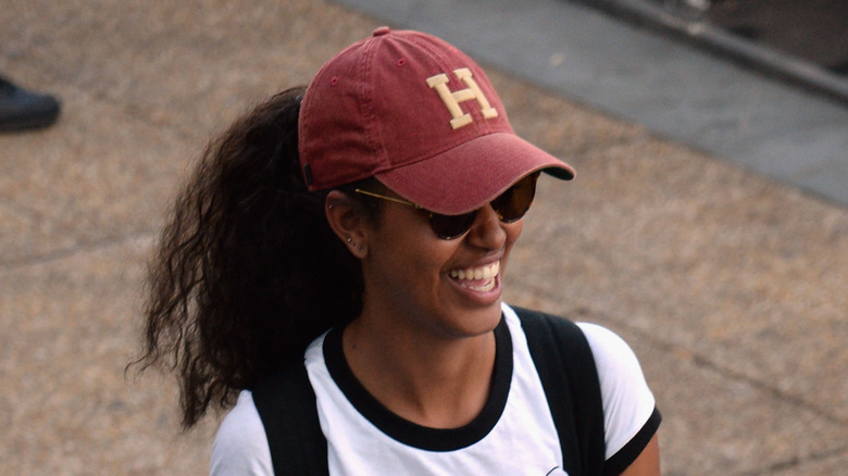 Malia Obama in a Harvard hat