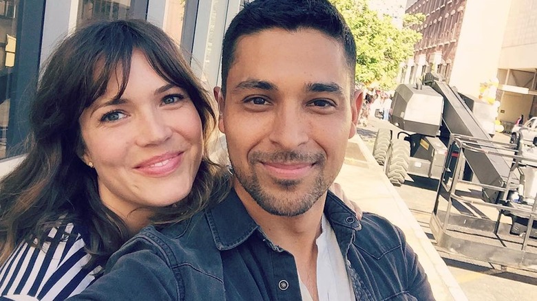 Mandy Moore and Wilmer Valderrama smiling