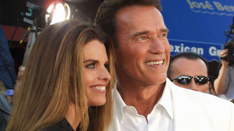 Maria Shriver and Arnold Schwarzenegger by restaurant