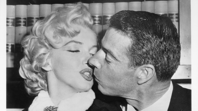 Marilyn and Joe kissing