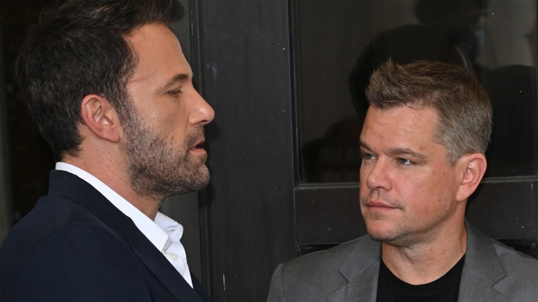 Matt Damon looking at Ben Affleck