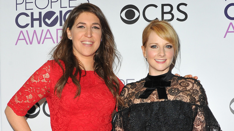 Mayim Bialik and Melissa Rauch smiling on the red carpet