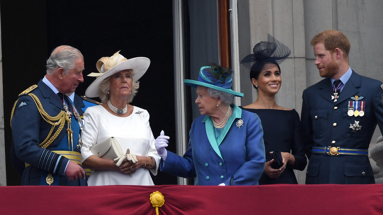 Prince Charles, Prince of Wales, Camilla, Duchess of Cornwall, Queen Elizabeth ll, Meghan, Duchess of Sussex and Prince Harry, Duke of Sussex on a balcony