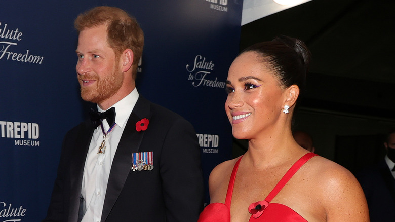 Harry and Meghan smiling