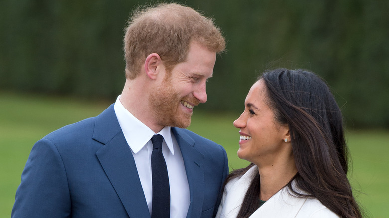 Prince Harry, Meghan Markle smiling together