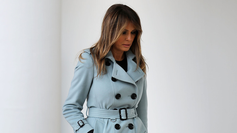 Melania Trump walking blue coat