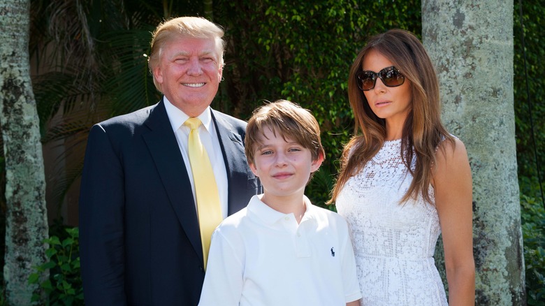 Donald, Barron, and Melania Trump posing together