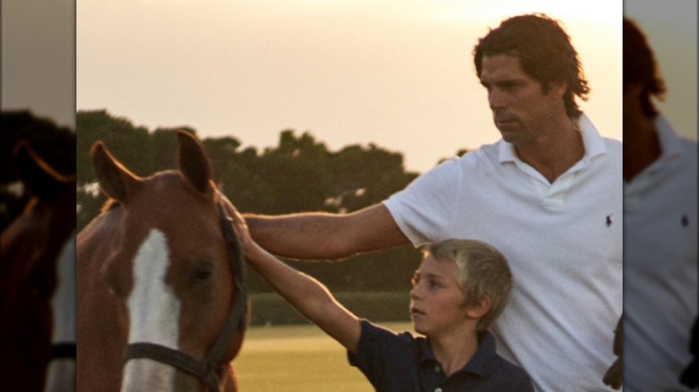 Nacho Figueras and son with a horse