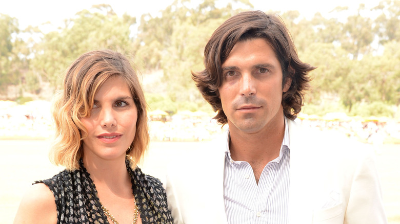 Delfina Blaquier Nacho Figueras posing outdoors