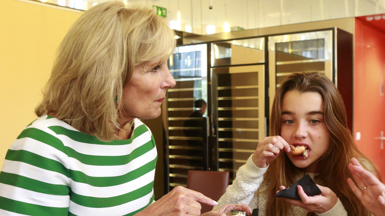 Jill and Natalie Biden tasting food in Paris together