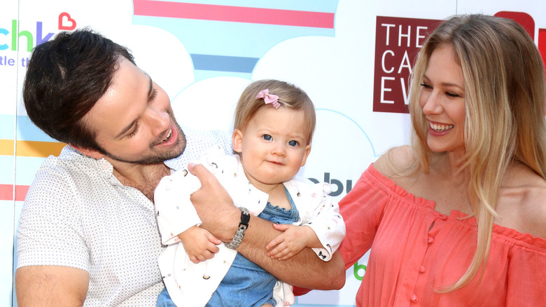 Nathan Kress, London Elise Moore, and daughter laughing