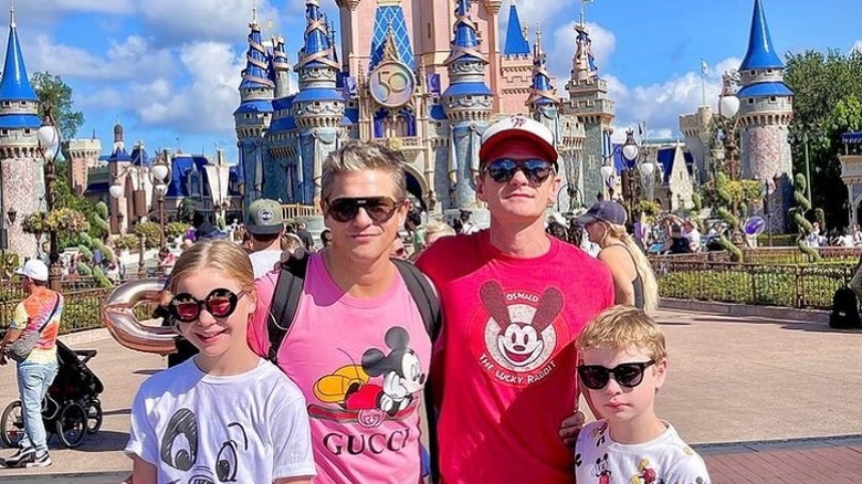 Neil Patrick Harris, David Burtka, Harper, and Gideon in Disney World