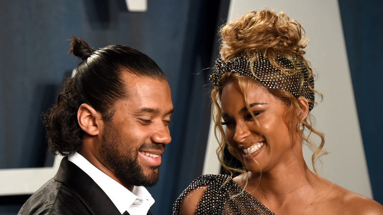 Ciara and Russell Wilson laughing together