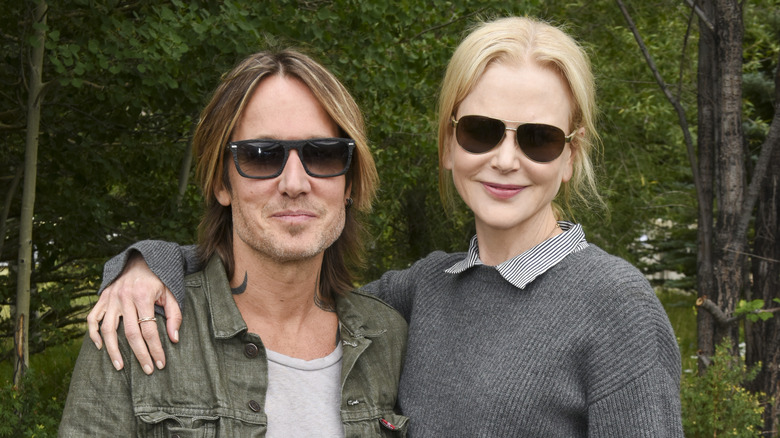 Keith Urban, Nicole Kidman wearing sunglasses