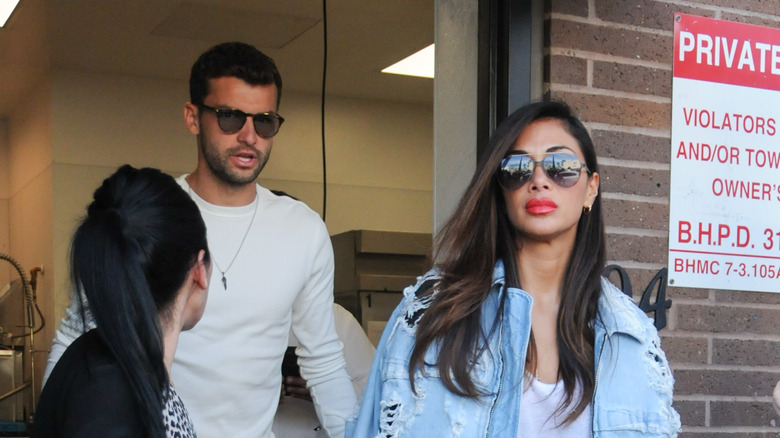 Nicole Scherzinger and Grigor Dimitrov walking