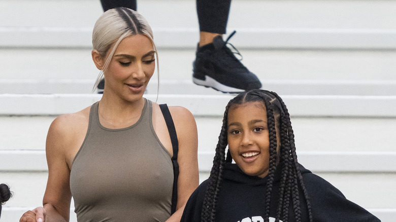 Kim Kardashian and North West smiling