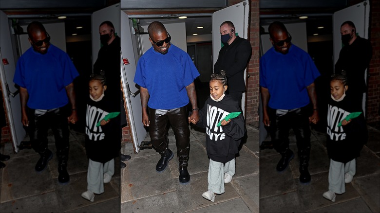 Kanye and North West arriving in London