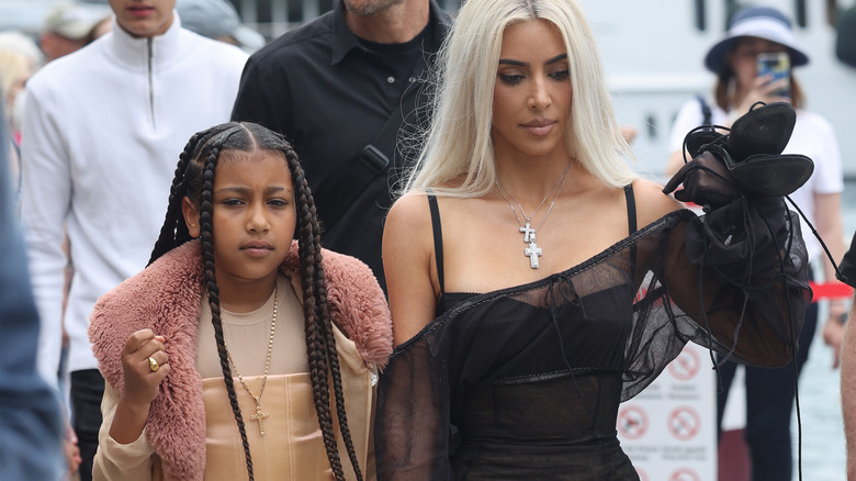 Kim Kardashian and North West walking in the street