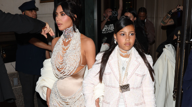 Kim Kardashian and North West at event