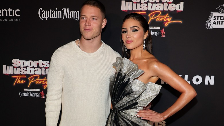 olivia Culpo and Christian McCaffrey at Sport Illustrated event 