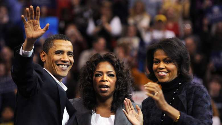 Oprah Winfrey and Barrack and Michelle Obama