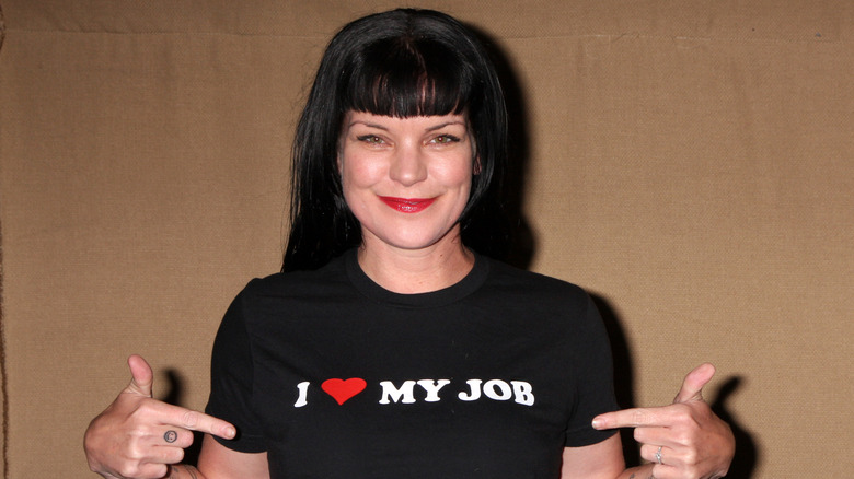 Pauley Perrette wearing "I Love My Job" shirt