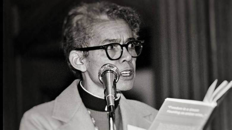 Pauli Murray speaking into a mic